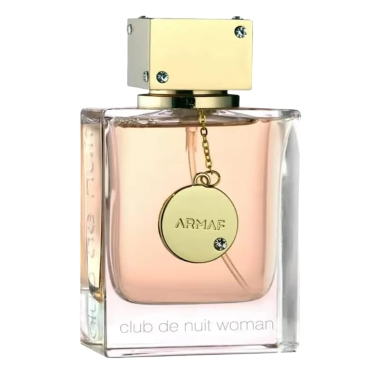 Armaf Club de Nuit Woman perfume bottle with pale yellow cap and gold circular pendant charm on light pink liquid