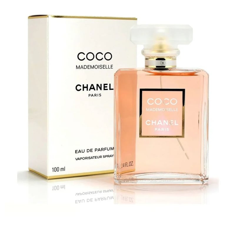 Coco Mademoiselle Chanel perfume 100ml bottle with cream colored box on white background