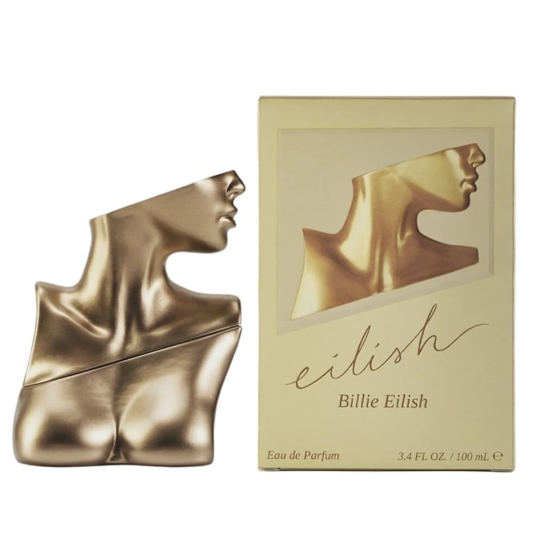 Billie Eilish Eilish perfume bottle and box set with gold sculptural design featuring a profile silhouette