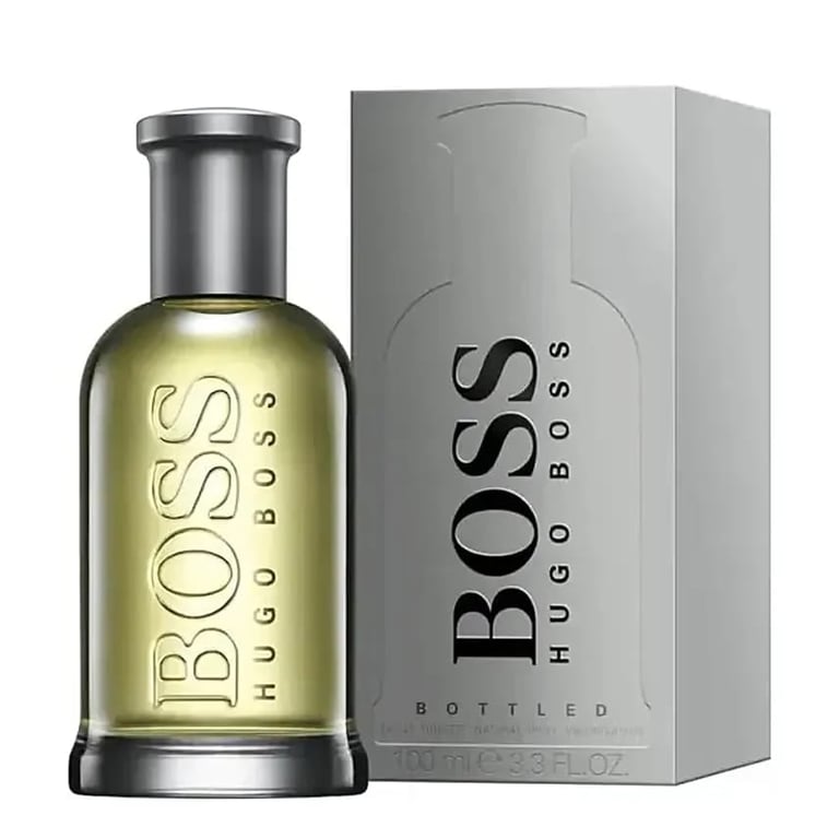 Hugo Boss Bottled cologne bottle with yellow liquid next to its white and gray product box