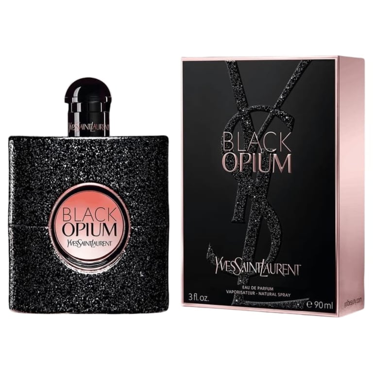 Black Opium fragrance bottle by Yves Saint Laurent next to its product packaging box